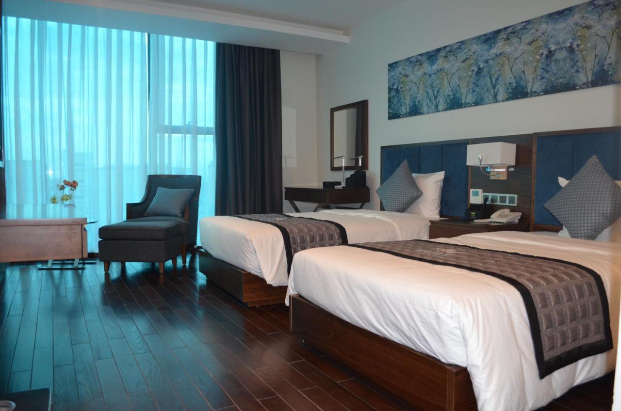Eagle Hotel Dai Tiet Екстериор снимка