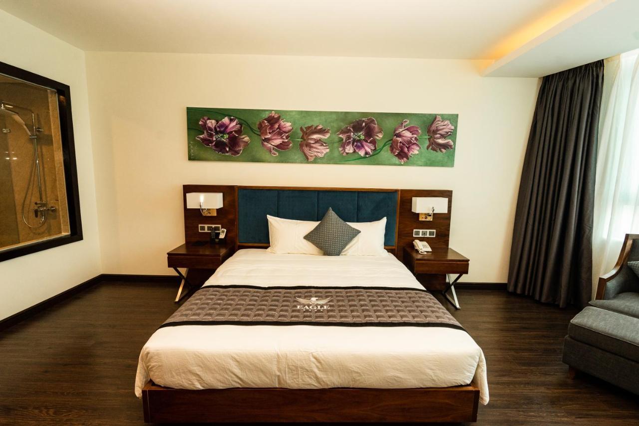 Eagle Hotel Dai Tiet Екстериор снимка