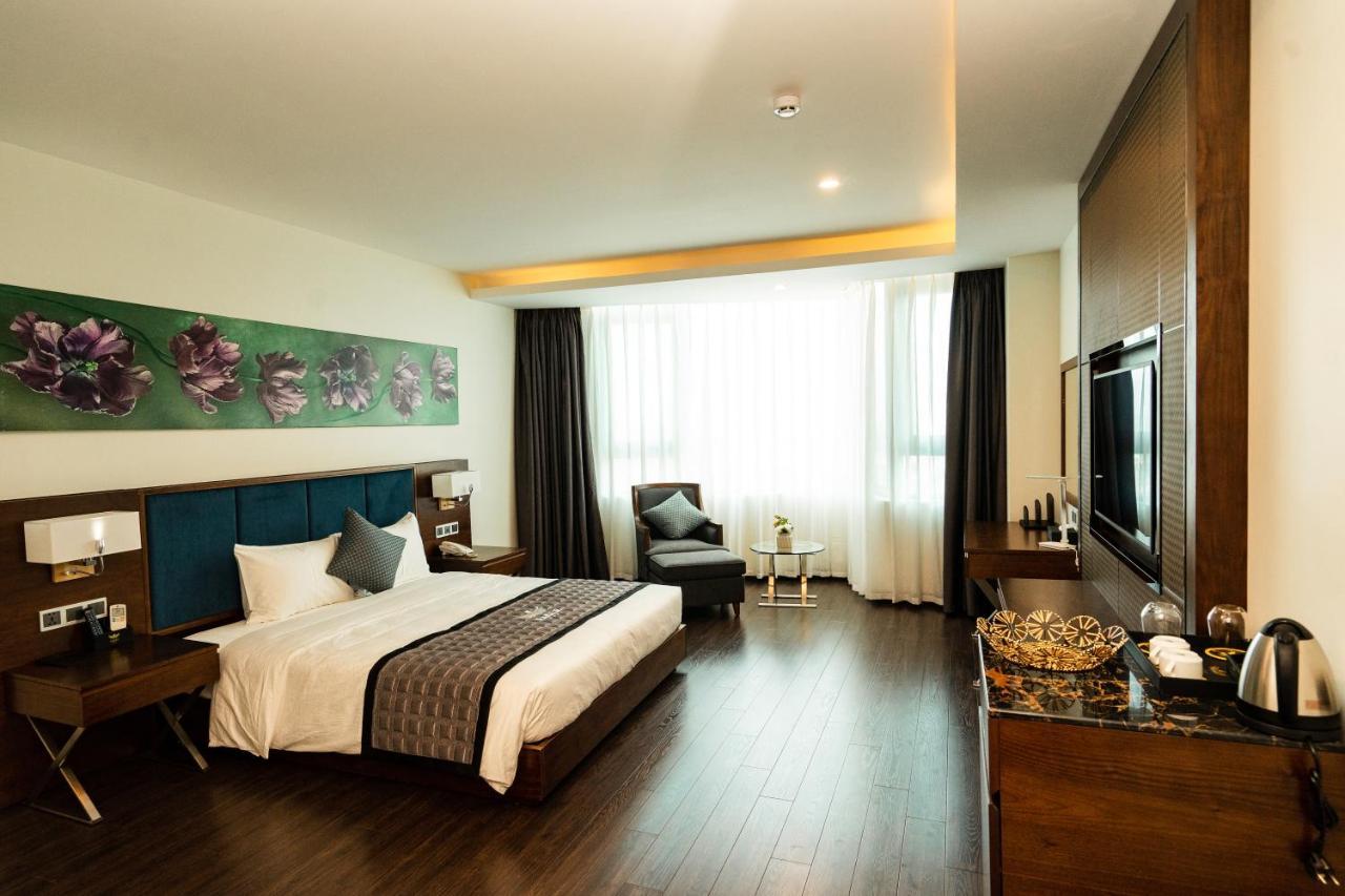 Eagle Hotel Dai Tiet Екстериор снимка