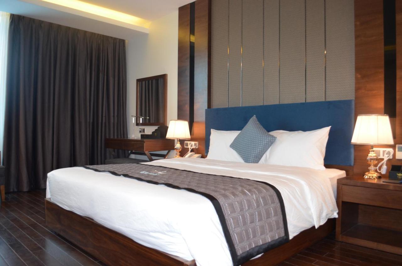 Eagle Hotel Dai Tiet Екстериор снимка