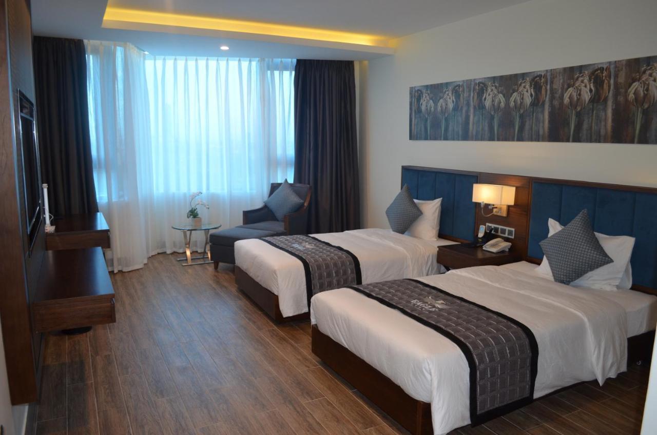 Eagle Hotel Dai Tiet Екстериор снимка