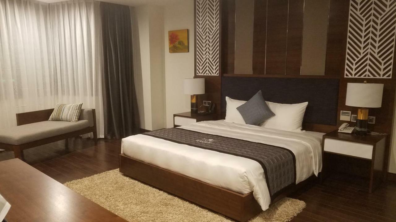 Eagle Hotel Dai Tiet Екстериор снимка